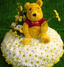 Maybe you would like to learn more about one of these? Childs Toy Floral Tribute