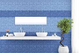 Notes of black add a graphic touch that highlights the beautifully laid out blue tile accents and enhances the overall design of the room. Oscar Blue Design Ideasfrom Nitco Tiles