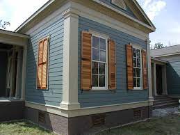 Faux shutters offer the appearance of wood at a price that is significantly lower than real wood. Exterior Shutter Pictures On Houses Window Shutters Ideas