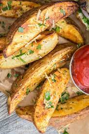 Learn how to cook a baked potato in the microwave. Oven Baked Potato Wedges Video Natashaskitchen Com
