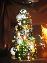 White lights, about 8 feet tall, reserved for green bay packer related ornaments, my living room tree, once. For The Hard To Buy For Packer Fan A Table Size Packer Christmas Tree Packers Christmas Green Bay Packers Crafts Green Bay Packers