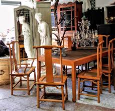 Your unique dining table should take care of your quick and casual dinners as well as your more elaborate entertaining needs. An Unusual Vintage Ming Influenced Chinese Hardwood Yellow Ocre Dining Table And Eight Chairs Aegm