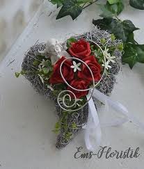 The song is called different moods. Grave Arrangement All Saints Day Heart 1622 Roses Angel Red For Urn Grave Funeral Flowers Diy Funeral Flowers Creative Flower Arrangements