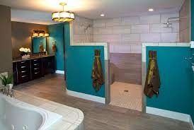 An effective bath panel idea to conceal the surround is to incorporate it into your tiling scheme. Dark Teal Bathroom Ideas Houzz