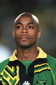 Who is former Premier League star Fitzroy Simpson?