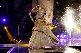 The masked singer crowned its season 4 winner on wednesday and revealed leann rimes as the champion in the sun costume. The Masked Singer Sun Breaks Down On Season 4 Finale People Com