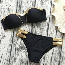 Our much anticipated black gold swimsuit is back! Black Gold Bikini Set Look Love Lust