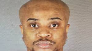 Hunt for 'armed and dangerous' man charged in Minneapolis park killing