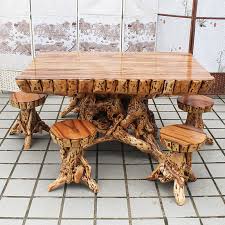 A custom made rustic coffee table is often called the anchor of the living room.the classic low table can pull a space together and set the tone that incorporates all the other furniture elements. Buy Code Art Housea Camphor Tree Root Carving Coffee Table Tea Table Wood Coffee Table Kung Fu Tea Sets To Send The New Six Stool In Cheap Price On Alibaba Com