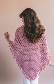 Pon·cho noun a garment of a type originally worn in south america, made of a thick piece of woolen cloth with a slit pattern created by melanie knox/coach mel's crochet corner. Crochet Ava Fringed Poncho Sewrella