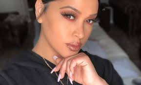 Lily Fired From Black Ink? After Fired from N-word Drama, Lily Hired Back