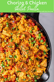 Chicken And Chorizo Paella Girl With The Iron Cast Paella Recipe Easy Paella Recipe Chicken Paella Recipe