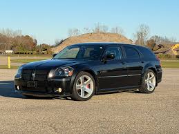 Image result for Brilliant Black 2010 Magnum