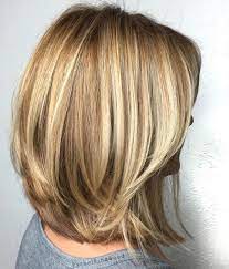 Bob haircut for women over 50. Honey Blonde Layered Bob For Thick Hair Medium Layered Haircuts Bob Hairstyles For Thick Thick Hair Styles