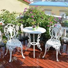 From small bistro sets to tables large enough to fit a small army, it's easy to incorporate a table and chair set into your backyard. 3 Piece White Bistro Patio Set Table And 2 May Chairs Set Furniture Garden Outdoor Seat Patio Set Patio Tablepatio Tables Sets Aliexpress