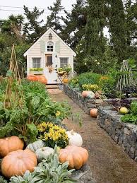 It has a steep pitched roof with a generous overhang which, along with the small pane windows gives it a traditional look which will blend into any garden. The Most Charming Garden Sheds On Pinterest Southern Living
