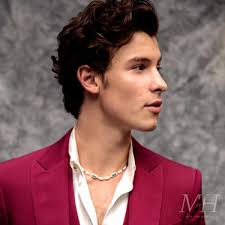 The distinguishing feature of the fringe hairstyle is the longer hair at the front of the head, which forms a waves on your forehead. Shawn Mendes Medium Length Curly Hair Man For Himself