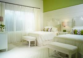 The hardwood flooring is topped with a furry gray area rug. Decorating A Mint Green Bedroom Ideas Inspiration