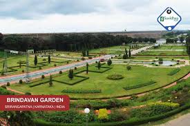 The Brindavana Gardens Is A Garden Located In The State Of Karnataka In India It Lies Adjoining The Krishnarajasagara Dam W Terrace Garden Green Lawn Parterre
