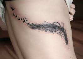 White feathers are a sign that somebody is watching over you. 50 Beautiful Feather Tattoo Designs Cuded Feather Tattoo Design Feather With Birds Tattoo Feather Tattoo Meaning