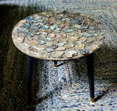 Not weird, to me, but absolutely wonderful! I love abalone shell, found  this lovely side table at a local junk/antique shop in western NC. For $10  this table absolutely came home with
