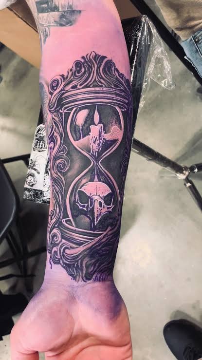 Hourglass tattoo with a candle tattoo now booking #blackandgreytattoo  #tattooideas #chicanostyle #losangeles candle tattoo skull tattoo