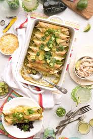 Make sure the tomatillos are facing cut side and the poblano skins are pour the remaining tomatillo sauce over the enchiladas, sprinkling the remaining cheese on afterwards. Poblano Sour Cream Chicken Enchiladas Vintage Kitty