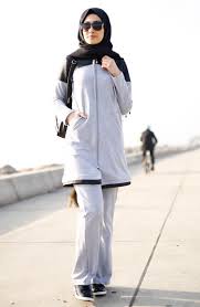 Sefamerve Tesettur Esofman Modelleri Genc Tesetturlu Kardeslerimizin Spor Yaparken Rahat Kullanmalari Amaciyla Uretilmistir Tesettu Fashion Normcore Raincoat