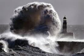 Bild von eastshaw guest house, seaham: Breathtaking Photographs Of Massive Waves Crashing Against A Lighthouse Lighthouse Lighthouse Storm Waves