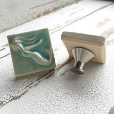 All sizes quoted as centres are the fixing centres of the two screws which locate and hold the product on. Mermaid Art Tile Cabinet Knob Drawer Pull Turquoise Beachyrustica