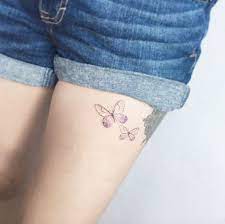 Butterflies On Thigh By Flower Tattoos Tattoos For Women Butterfly Tattoos For Women