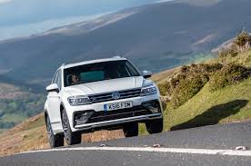 Maybe you would like to learn more about one of these? New Volkswagen Tiguan R Line Review A Rewarding Suv Mpg And Running Costs Evo
