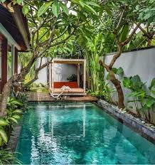 27 Awesome Pool Fence Ideas For Privacy And Protection Urlaub Awesome Fence Ideas Pool Backyard Pool Designs Pool Houses Tropical Pool Landscaping