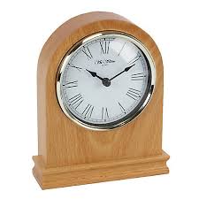 This lovely shaker style furniture is simply elegant, with amish construction to. Wooden Arched Mantel Clock Freemans