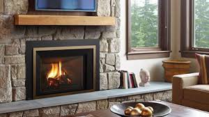 Don't fight splinters, the draft, and wet wood. Gas Fireplace Inserts Replace Old Wood Fires Regency