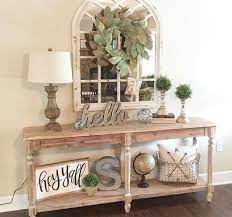 For ideas on how to revamp a cluttered or empty console, see here how dering hall interior designers topped beautiful tables with books, vases, and other curated objects. Farmhouse Entrance Console Table Decor Novocom Top