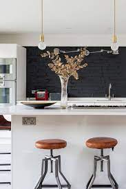 The white quartz worktops look beautiful too, but you need the right colour units to really set it off. 31 Black Subway Backsplash Ideas The Power Of Black Color Black Backsplash Contemporary Kitchen Design Brick Backsplash