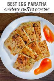 Egg Paratha Or Anda Paratha Is A Delicious Layered Flat Bread With Omelette Stuffing It Is An Easy And Healthy In Egg Paratha Low Carb Recipes Dessert Paratha