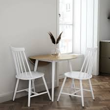 Extending table in dark grey and pale oak seats 8. Round Oak And White Drop Leaf Dining Table With 2 White Spindle Dining Chairs Furniture123