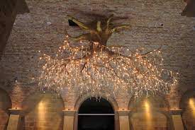 Upside down 6' white artificial christmas tree. Chandeliers Donald Lipski