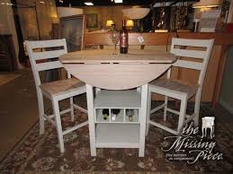 Drop Leaf Pub Table In An Ash Gray With Light Toned Top Two Barstools There Is Wine Bottle Storage At The Base Super Functional Pub Table Table Cozy House