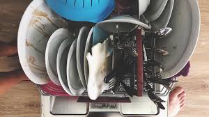 Cleaning the dishwasher spray arms. How To Load A Dishwasher Correctly The Definitive Guide Huffpost Life