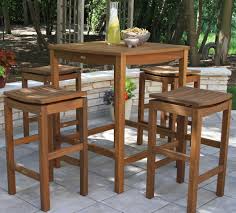 This outdoor bar table creates a spot to sit (or stand) with a friend and a cold beverage on your outdoor patio. Hardwood Outdoor Bar Height Tables And Chairs For Patio Deck Or Porch