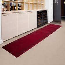 Kitchen Long Red Kitchen Floor Mats Above Ceramic Floor Under Wood Rack Wood Cupboard With Brown Wooden Door The Application Of Kitchen Floor Mats