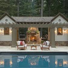 outdoor kitchen with gray barn doors on