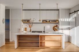 Mixing the contemporary aesthetics of a waterfall kitchen island with traditional elements will produce a fluid, timeless appeal. 7 Sleek Waterfall Island Ideas To Inspire Your Kitchen Renovation