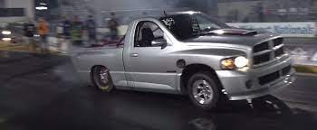 The ride height was lowered, and the front bumper was replaced with a more prominent version. 1 900 Hp Dodge Ram Srt 10 Pulls 7s Quarter Mile World Record Run Autoevolution