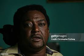 Neo-Nazi attack victim Noel Martin sits in a wheelchair in his home... News  Photo