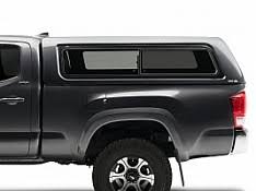 The camper's construction consists of a patented, single wall, riveted aluminum, insulated with rigid r5 foam lined with suede on the inside. Toyota Tacoma Gallery A R E Truck Caps And Tonneau Covers