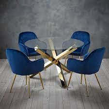 Maison Gold Leg Round Glass Dining Table Four Royal Blue Velvet Chairs Runder Esstisch Aus Glas Blaue Samtstuhle Esszimmerstuhl